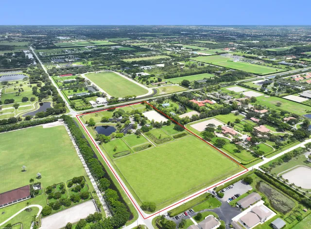 a view of a swimming pool with a lake view