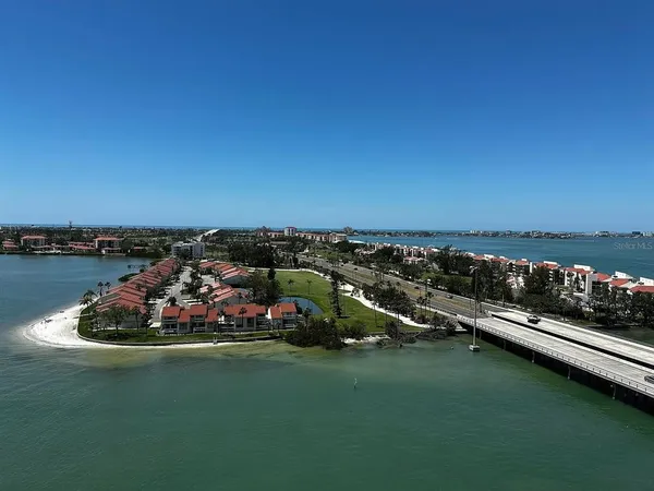 a view of a lake with a car park