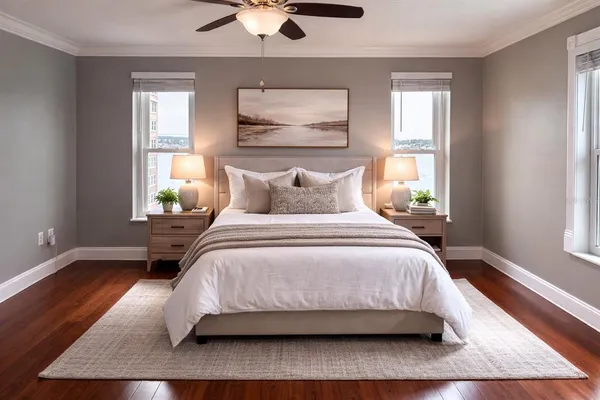 a bedroom with a bed and window