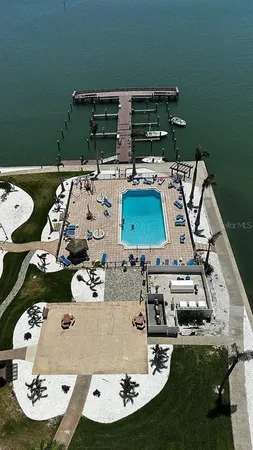 an aerial view of a house with outdoor space