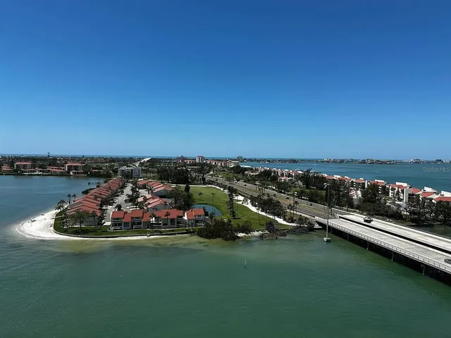 a view of a lake with a car park