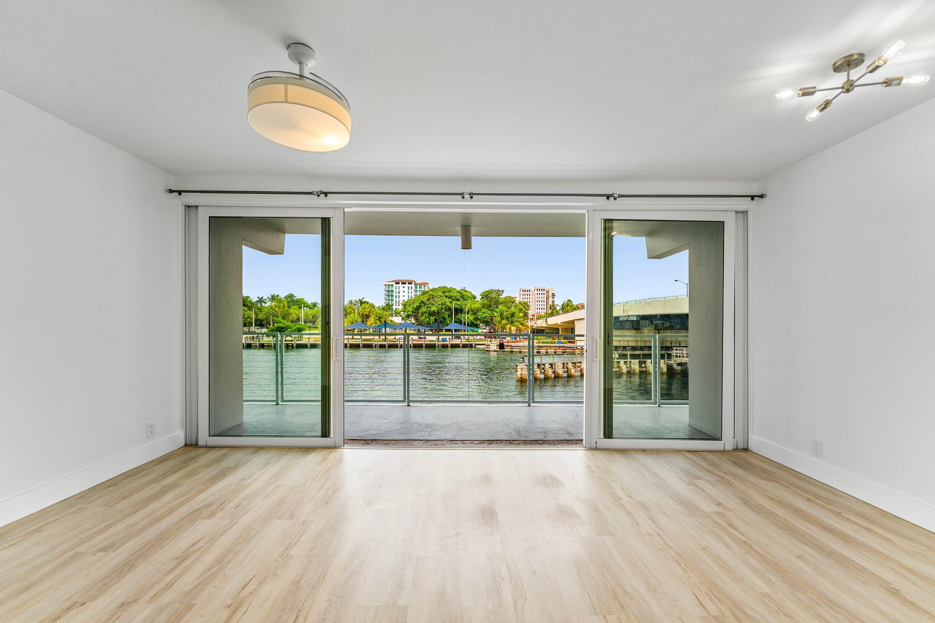 65 Southeast Spanish Trail, Unit 2030 Boca Raton, FL 33432 - Photo 2 of 28 Living Room facing west