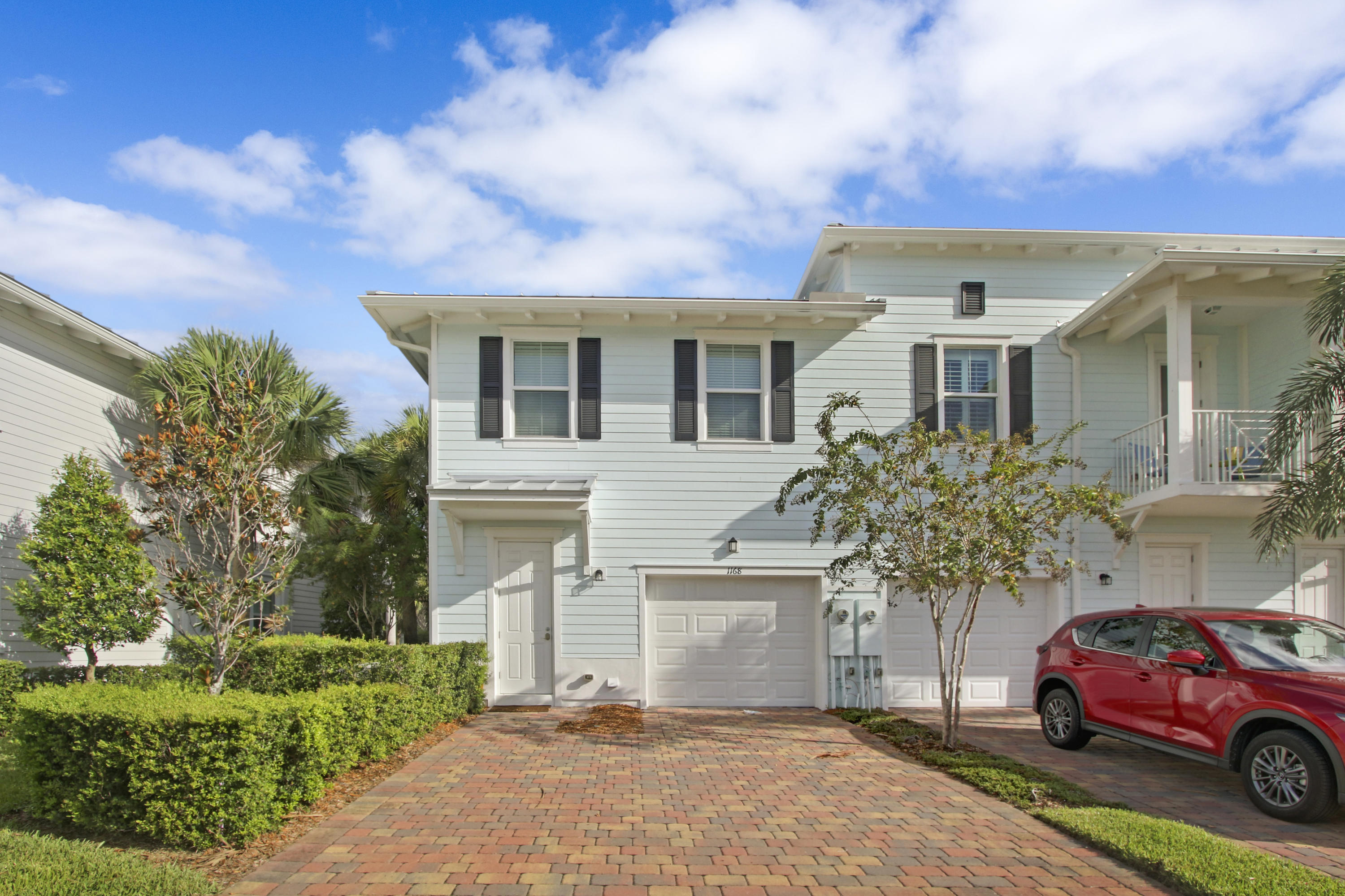 1168 South Community Drive Jupiter, FL 33458 - Photo 15 of 18 a house with a outdoor space