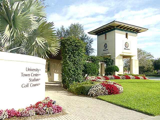 1168 South Community Drive Jupiter, FL 33458 - Photo 18 of 18 a front view of a house with garden