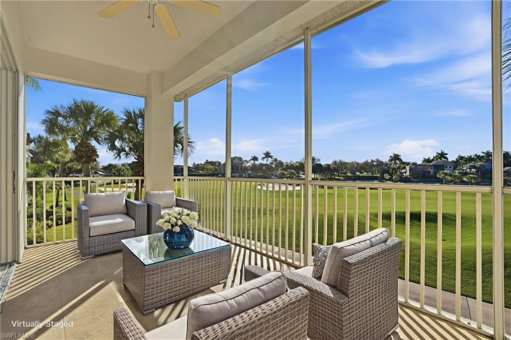 5963 Trophy Drive, Unit 2003 Naples, FL 34110 - Photo 12 of 50 Sunroom featuring a ceiling fan, an outdoor hangout area, and view of golf course