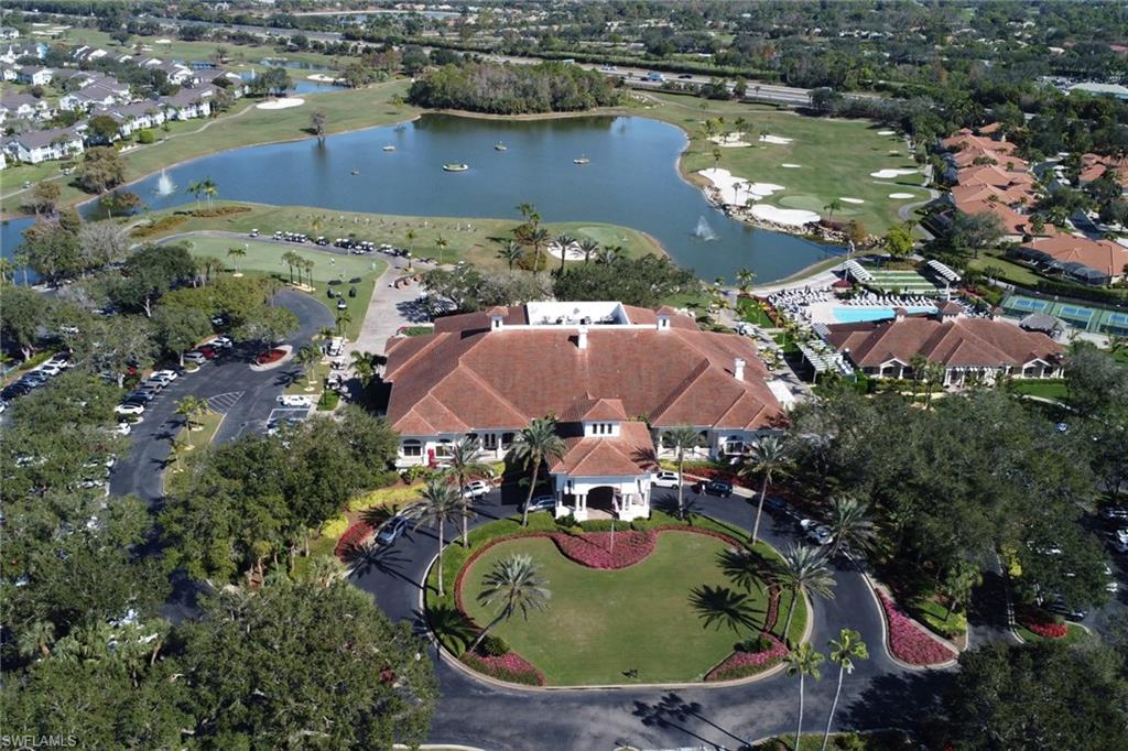 5963 Trophy Drive, Unit 2003 Naples, FL 34110 - Photo 25 of 50 Aerial overview of property's location featuring a golf club, a nearby body of water, and nearby suburban area