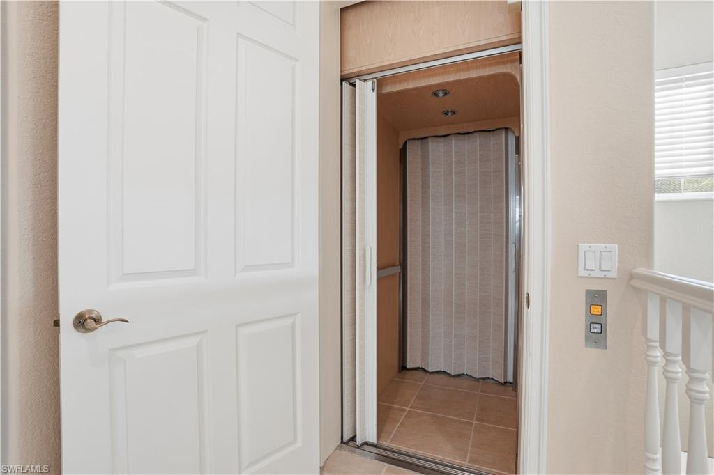 5963 Trophy Drive, Unit 2003 Naples, FL 34110 - Photo 43 of 50 Property entrance featuring elevator