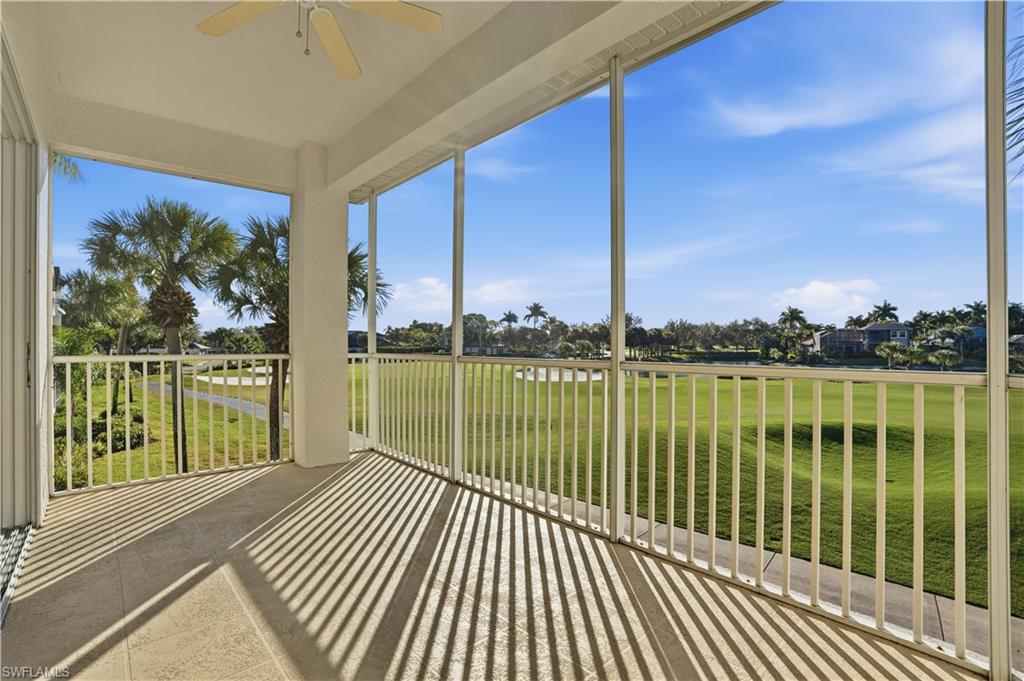 5963 Trophy Drive, Unit 2003 Naples, FL 34110 - Photo 46 of 50 Unfurnished sunroom with golf course view