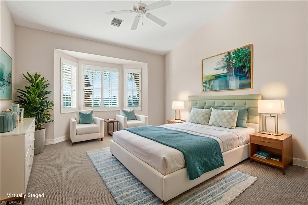 5963 Trophy Drive, Unit 2003 Naples, FL 34110 - Photo 6 of 50 Bedroom featuring carpet floors and a ceiling fan