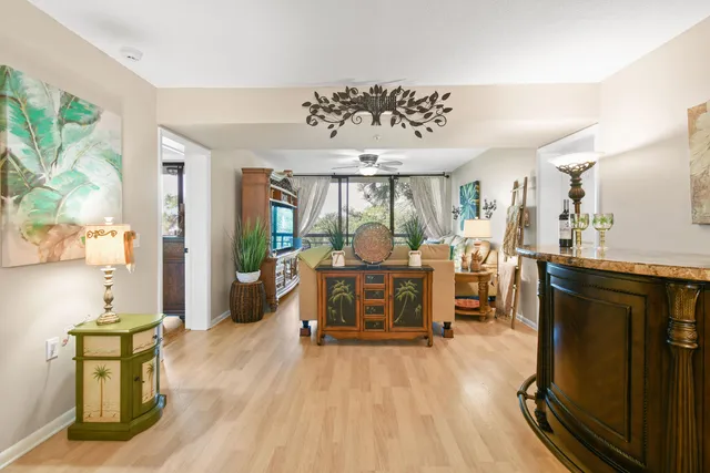 a view of a living room and dining room