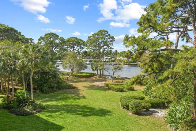 a view of a balcony with chairs