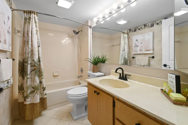 a view of a storage and utility room with washer and dryer