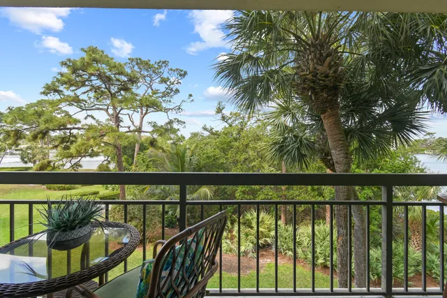 a view of balcony with furniture