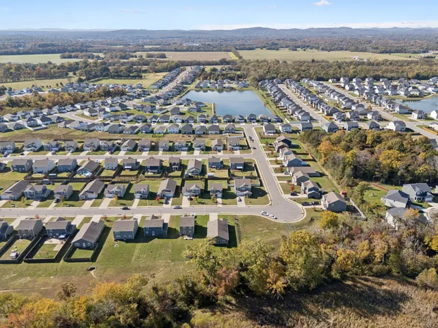 an aerial view of residential building and lake view