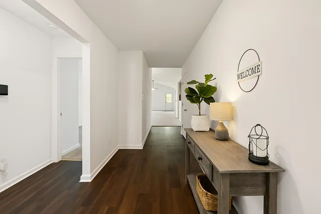a view of entryway with wooden floor
