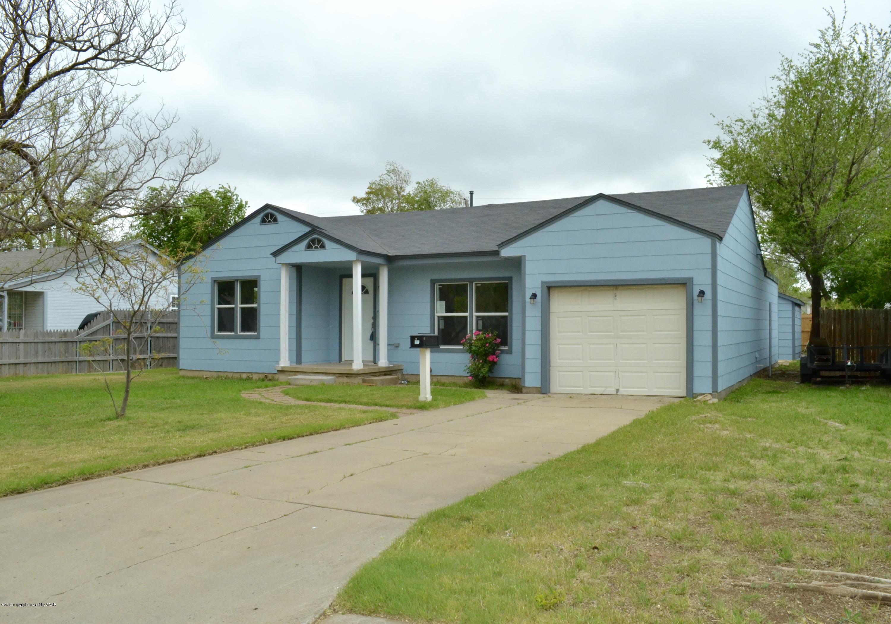 4004 South Lipscomb Street Amarillo, TX 79110 - Photo 1 of 49 a front view of a house with a yard and garage