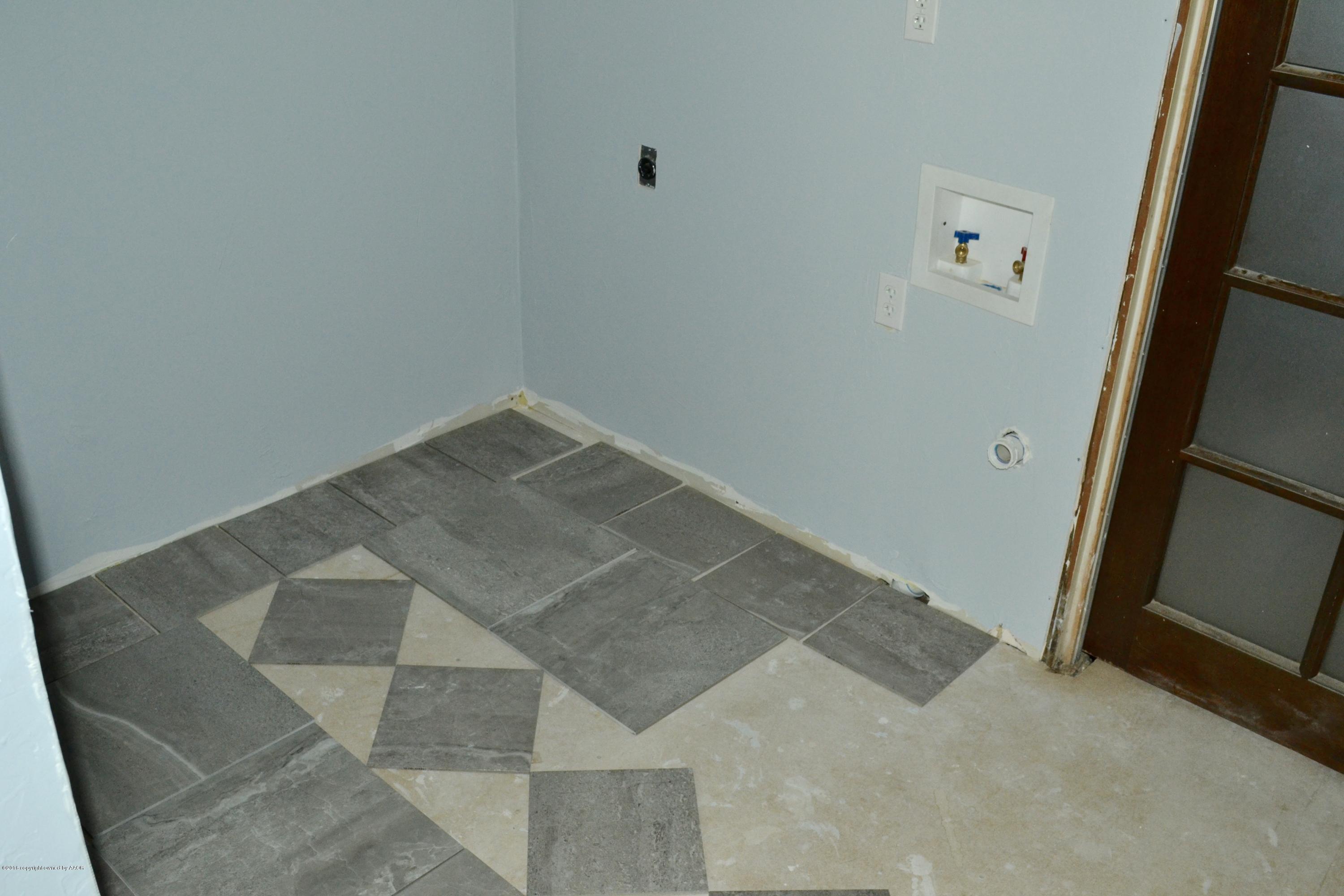 4004 South Lipscomb Street Amarillo, TX 79110 - Photo 29 of 49 an empty room with wooden floor