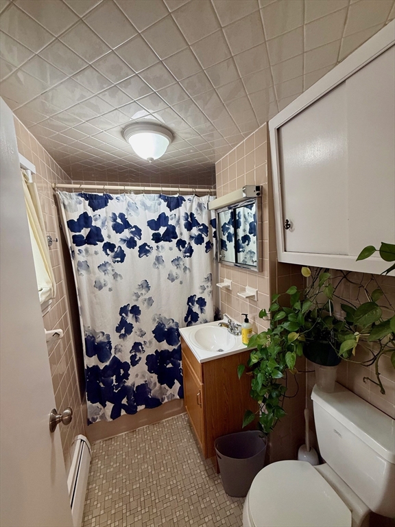 56 Lincoln Road, Unit 56 Newton, MA 02458 - Photo 5 of 10 a room with gym equipment