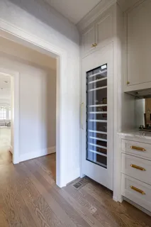 a bedroom with a bed and a table in it