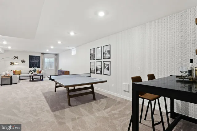 a living room with furniture and a table