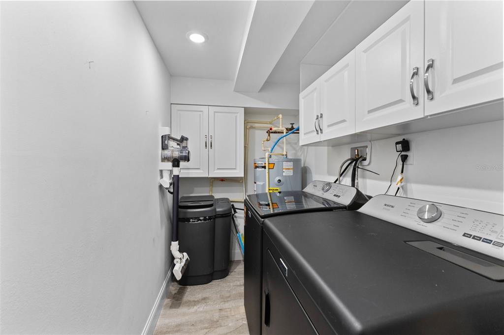 16332 Gulf Boulevard, Unit 2B Redington Beach, FL 33708 - Photo 34 of 60 a kitchen with a sink cabinets and appliances