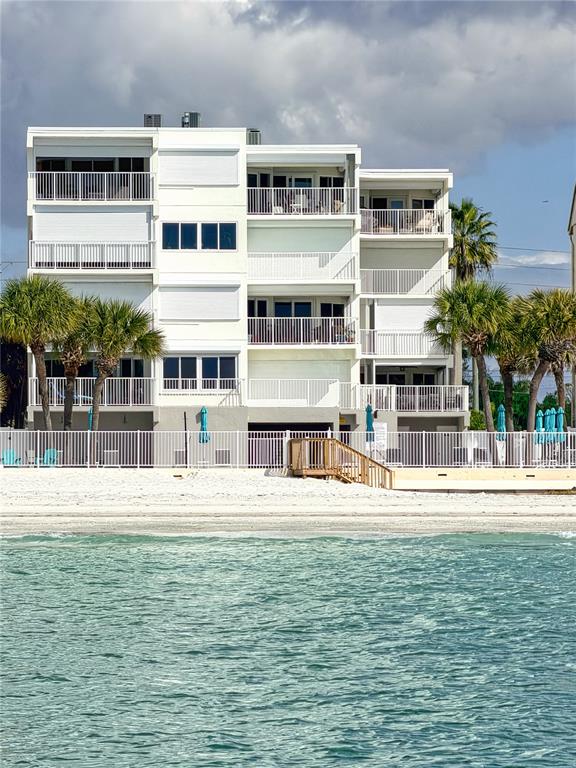 16332 Gulf Boulevard, Unit 2B Redington Beach, FL 33708 - Photo 60 of 60 a house view with swimming pool in front of it