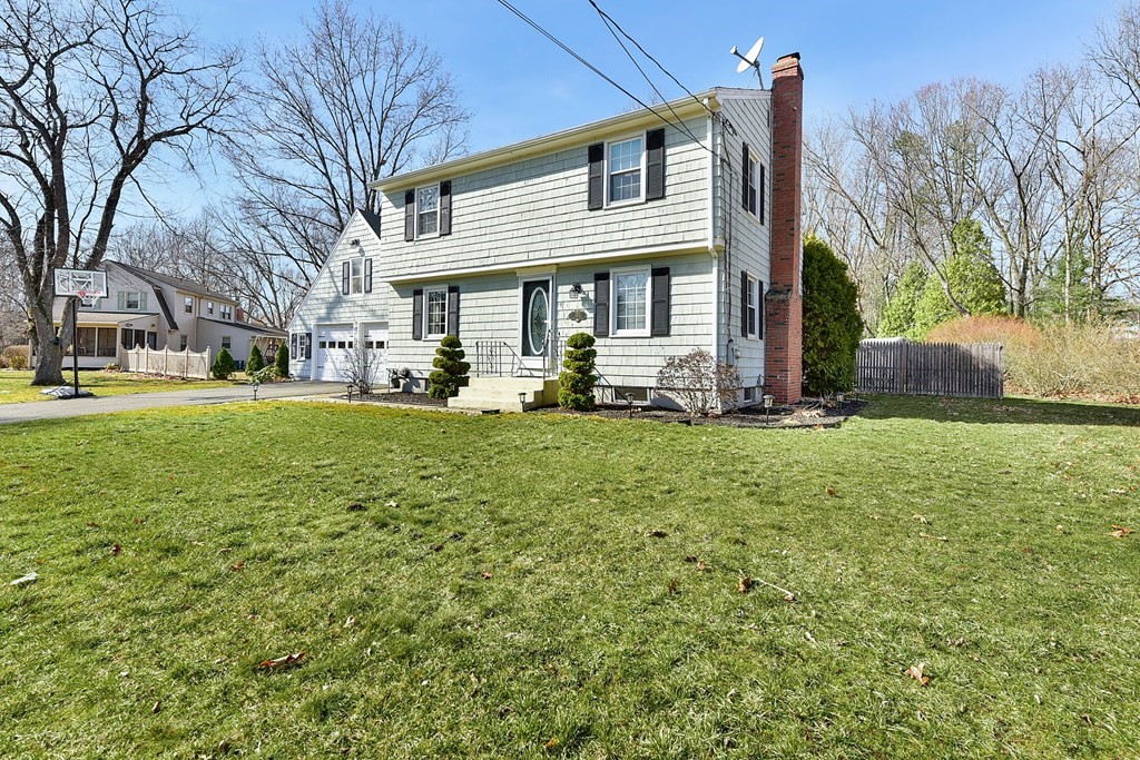 322 Wolf Swamp Road Longmeadow, MA 01106 - Photo 2 of 24 a view of a house with a yard porch and sitting area