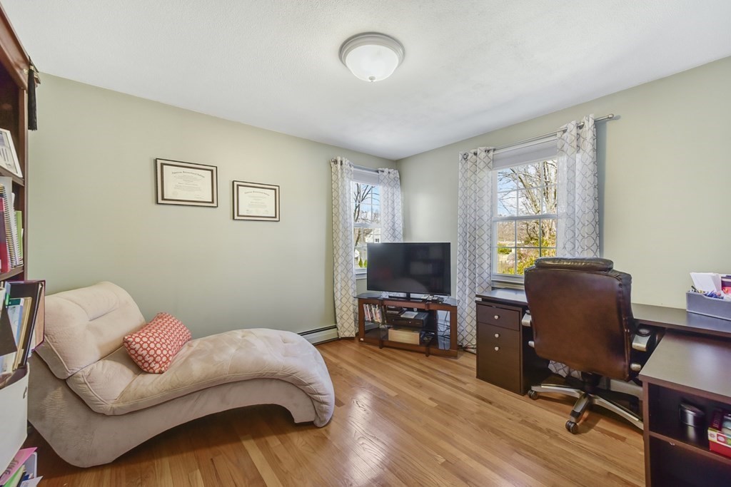 322 Wolf Swamp Road Longmeadow, MA 01106 - Photo 21 of 24 a bedroom with a workspace