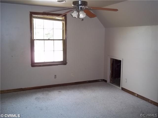 13917 Hackberry Road Chester, VA 23836 - Photo 8 of 10 an empty room with a window
