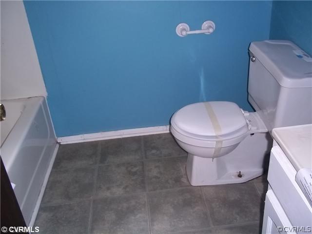 13917 Hackberry Road Chester, VA 23836 - Photo 10 of 10 a bathroom with a sink and a toilet
