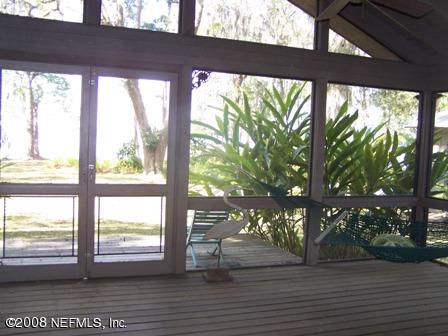 2668 Holly Point Road East Orange Park, FL 32073 - Photo 6 of 11 Back sreened porch