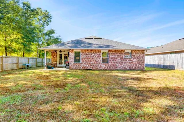 a view of a house with a swimming pool