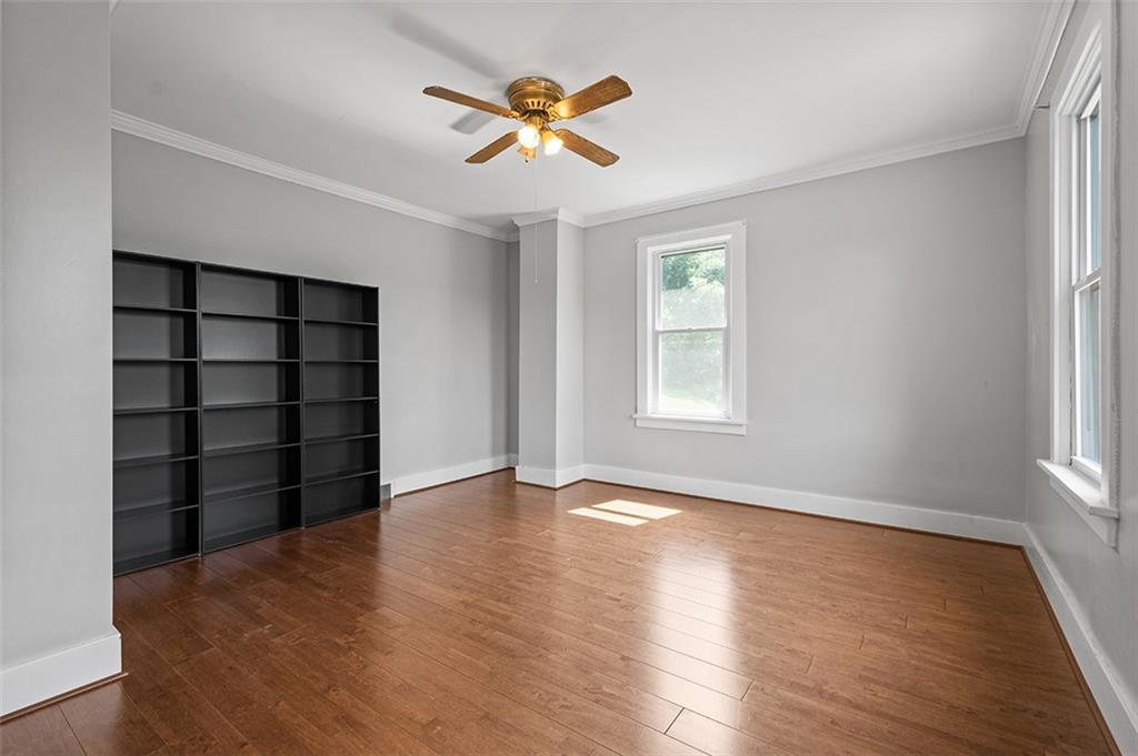 1815 Main Street Bridgeville, PA 15017 - Photo 12 of 32 an empty room with closet and windows