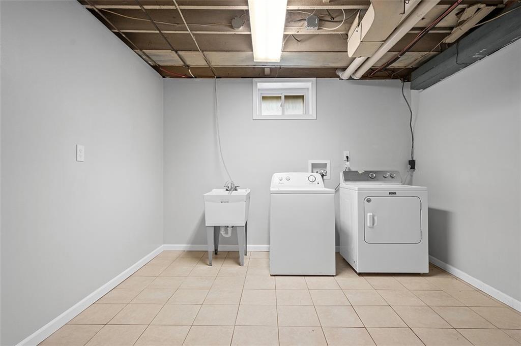1815 Main Street Bridgeville, PA 15017 - Photo 24 of 32 a utility room with dryer and washer