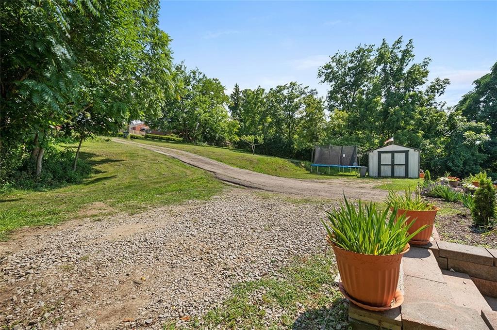 1815 Main Street Bridgeville, PA 15017 - Photo 30 of 32 a house with a garden