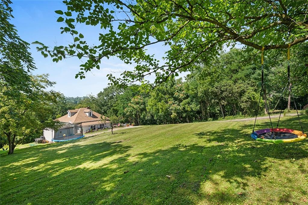 1815 Main Street Bridgeville, PA 15017 - Photo 31 of 32 a view of a house with a backyard