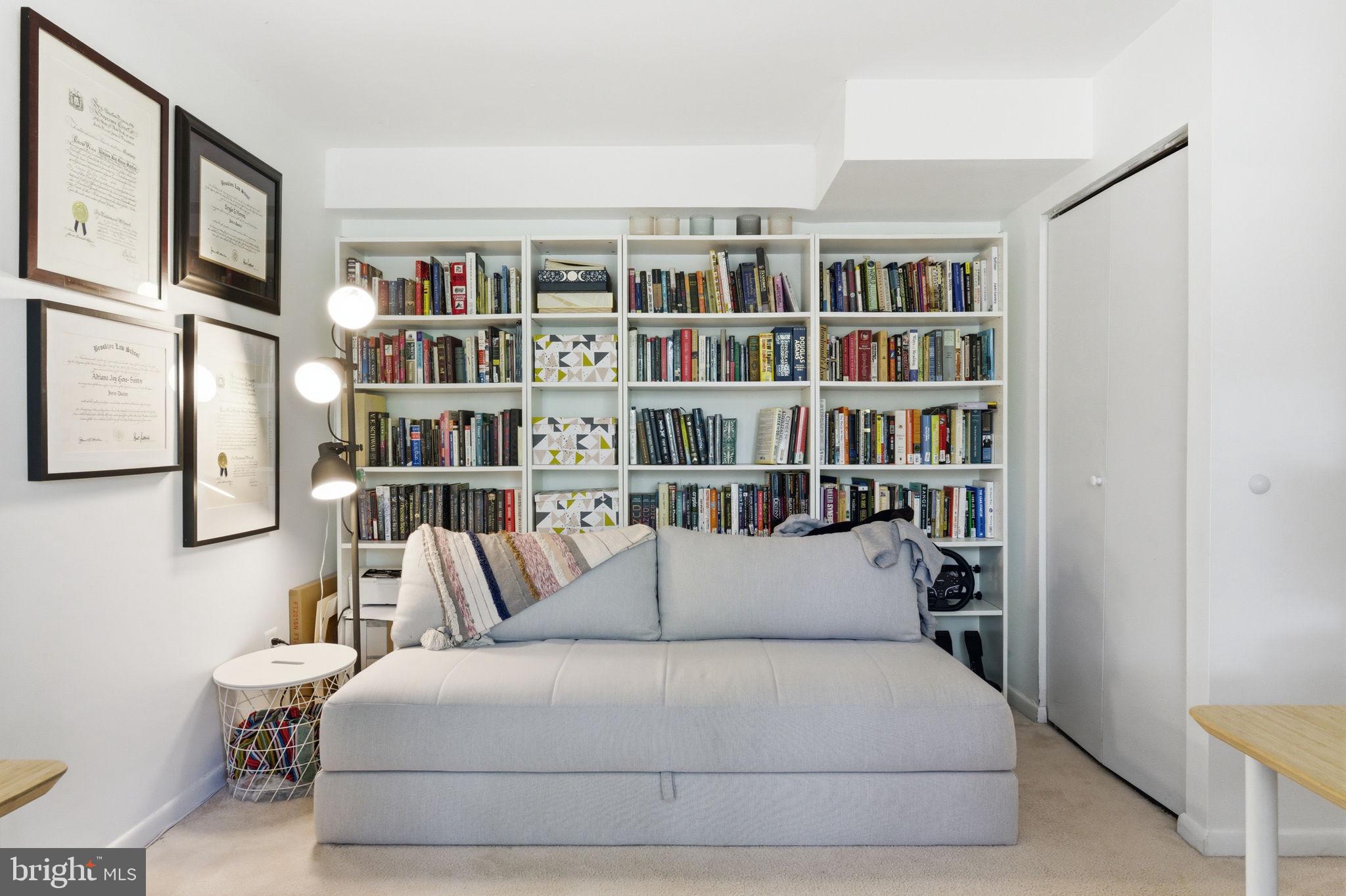 11260 Chestnut Grove Square, Unit 337 Reston, VA 20190 - Photo 37 of 82 Cozy reading nook with books galore.
