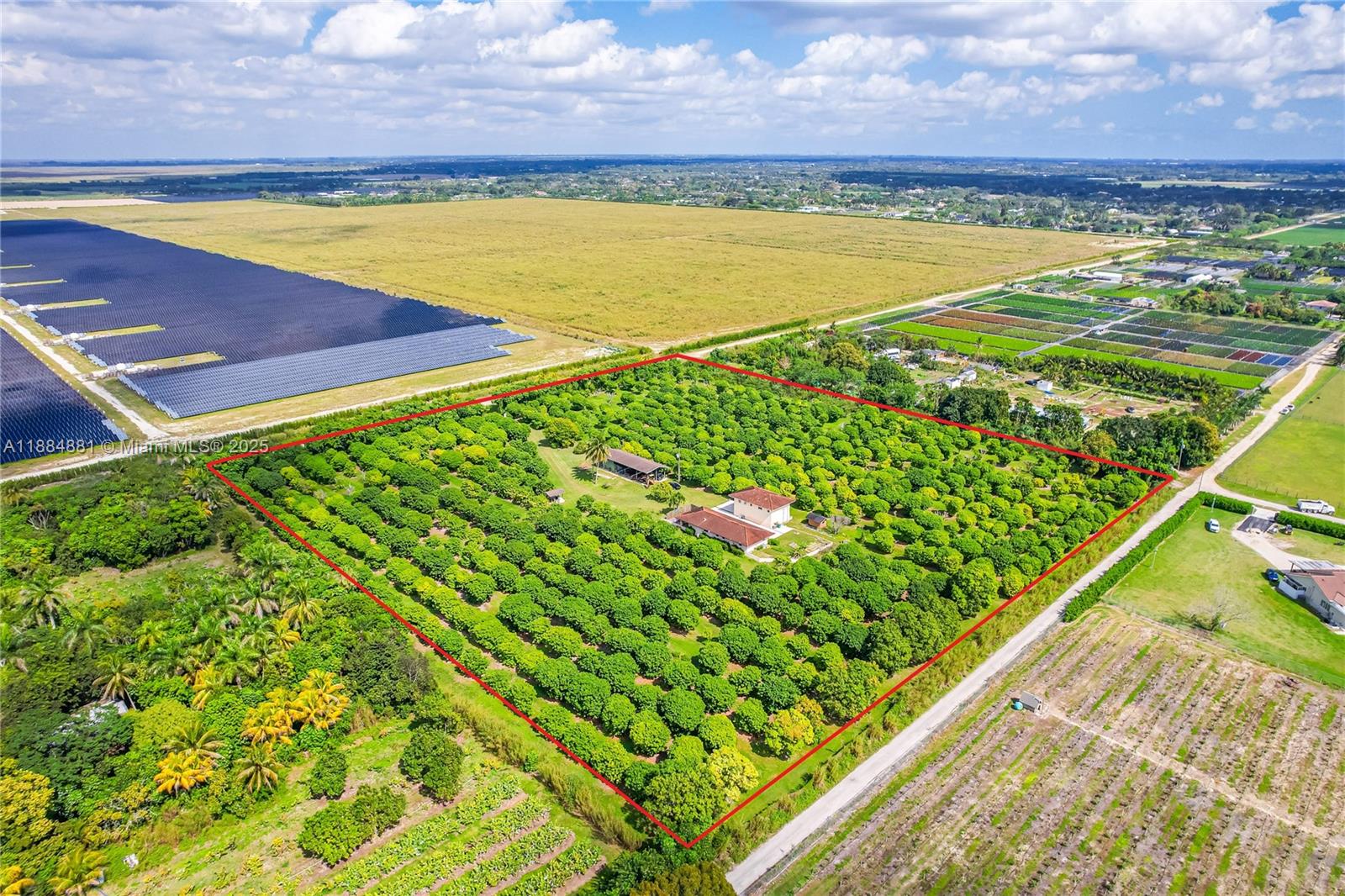 10 ACRE GROSS 3/2 FARM HOUSE, WAREHOUSE W/ APARTMENT & EMPLOYEE BATHROOMS, POLE BARN W/ OFFICE & CAMERA SYSTEM ON PRIVATE NETWORK & 500+/- ASSORTED LYCHEE GROVE.