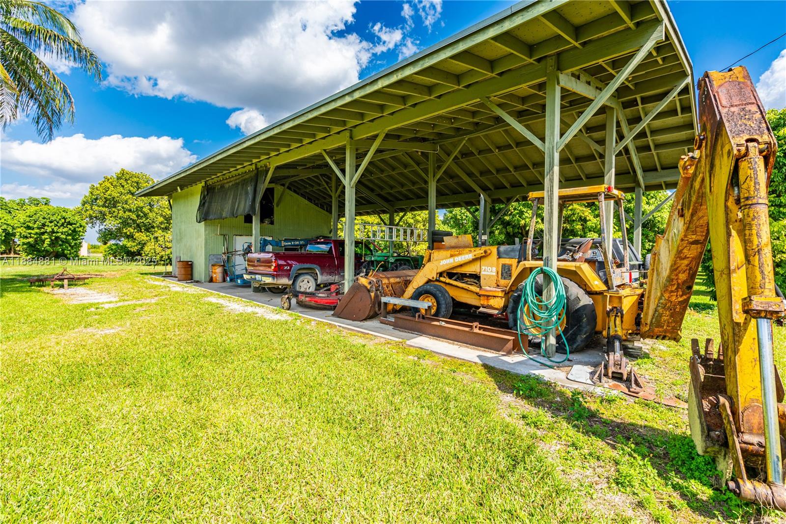 22220 Southwest 248th Street Homestead, FL 33031 - Photo 34 of 44 POLE BARN WITH A/C OFFICE, 4 CORNER SECURITY CAMERA SYSTEM ON PRIVATE NETWORK.