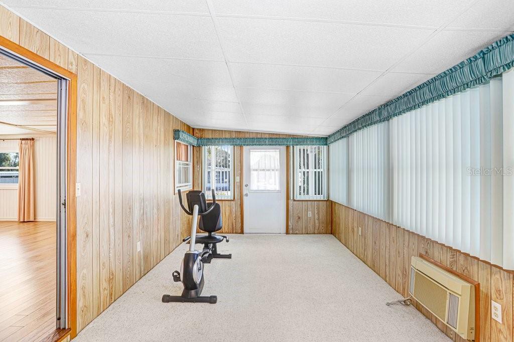 14299 Nectarine Street Brooksville, FL 34613 - Photo 14 of 41 a view of a room with gym equipment