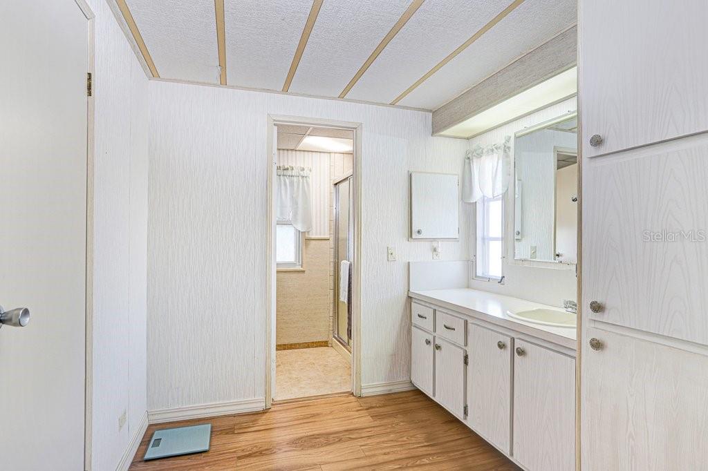 14299 Nectarine Street Brooksville, FL 34613 - Photo 23 of 41 a large white kitchen with a sink