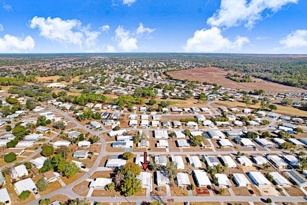 14299 Nectarine Street Brooksville, FL 34613 - Photo 29 of 41 an aerial view of multiple house