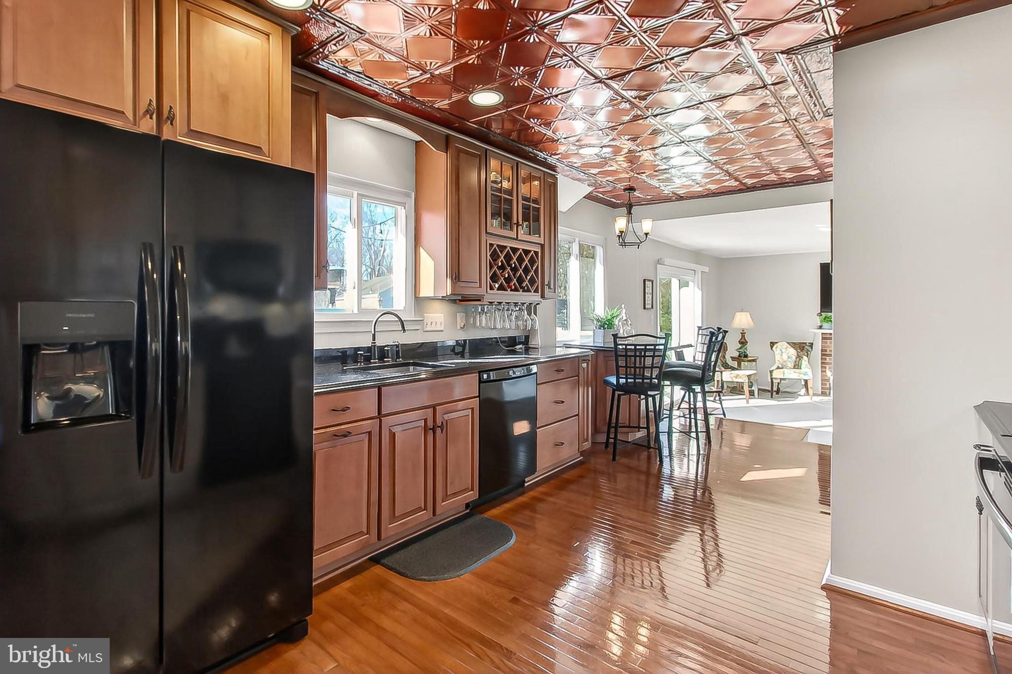9056 Brook Ford Road Burke, VA 22015 - Photo 11 of 56 Gorgeous renovated kitchen = pressed metal ceiling