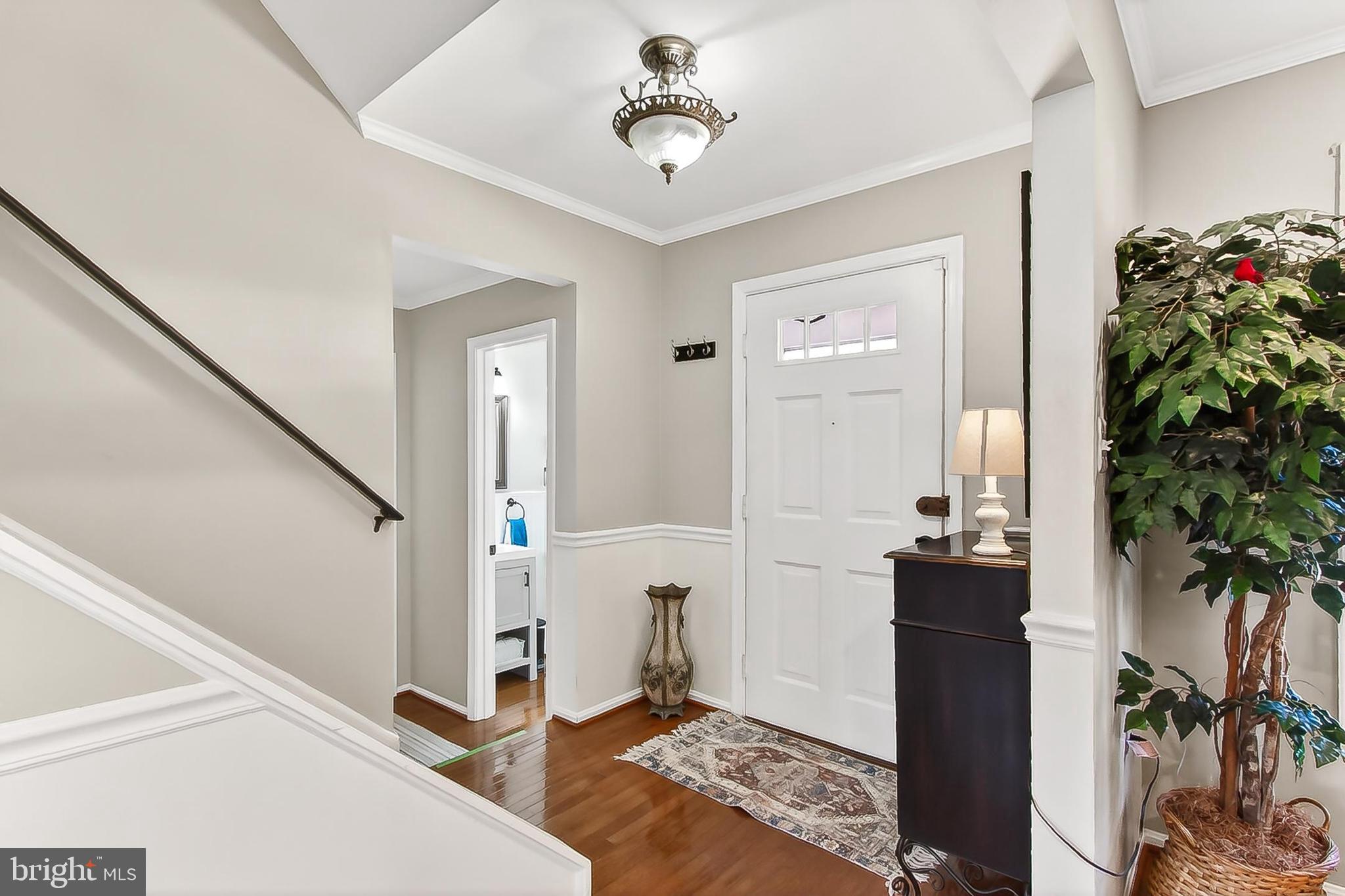 9056 Brook Ford Road Burke, VA 22015 - Photo 4 of 56 Foyer has wood floors