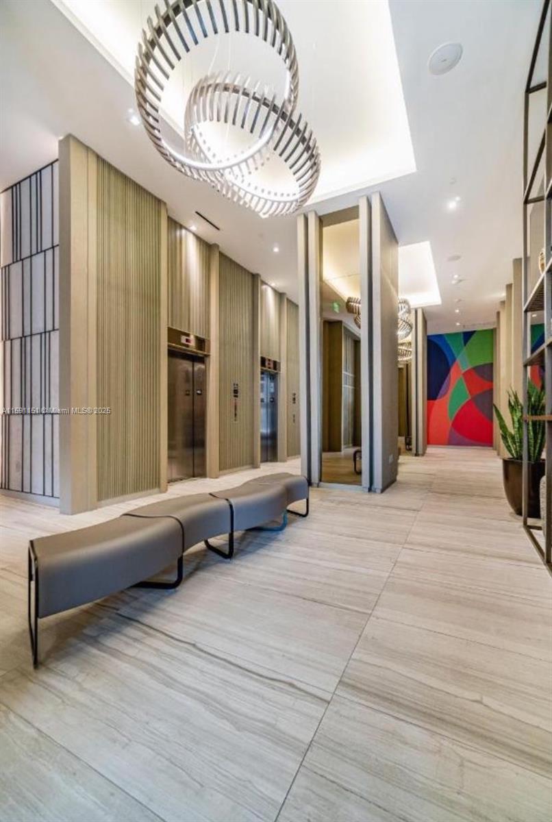 4010 South Ocean Drive, Unit R2407 Hollywood, FL 33019 - Photo 13 of 33 a living room with furniture