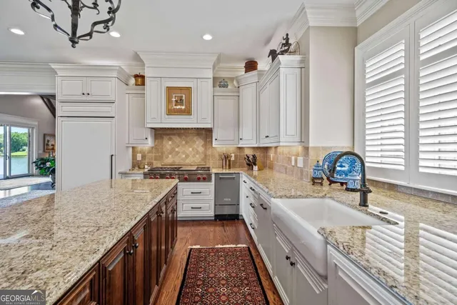 a bedroom with a bed and a table in it