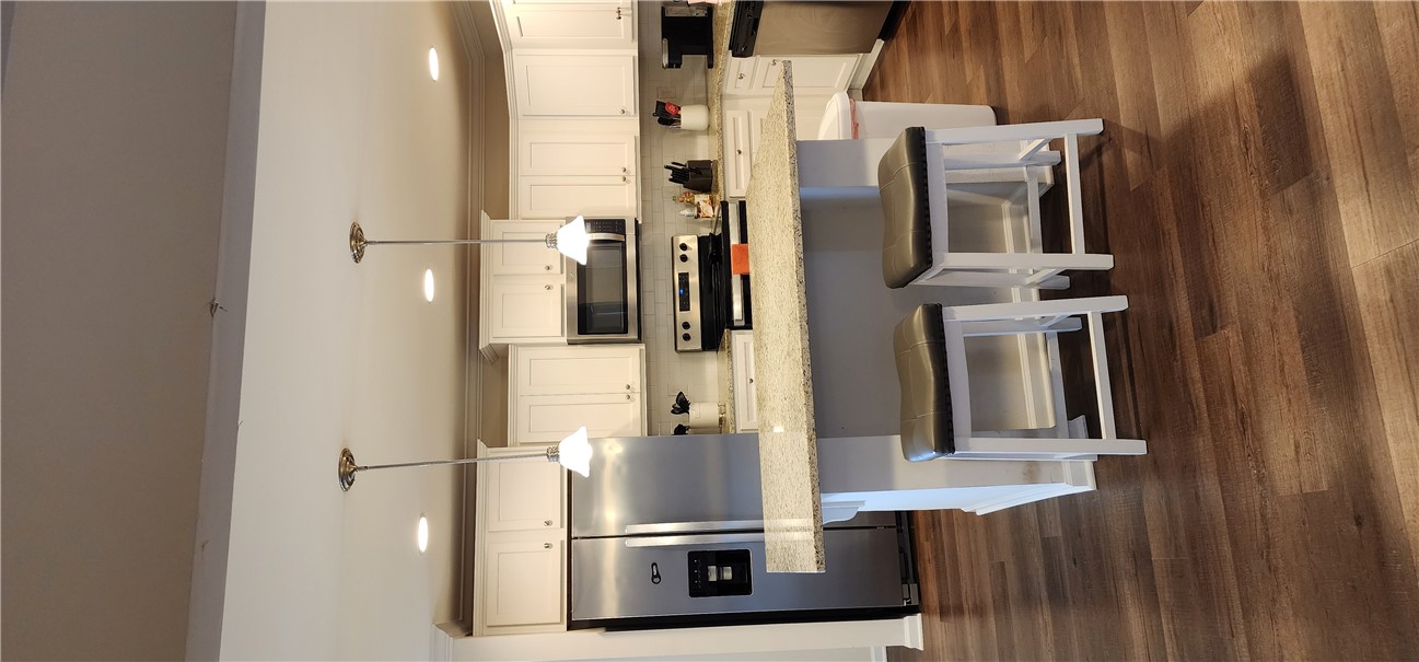 140 Sunny Point Loop Central, SC 29630 - Photo 11 of 31 A well-appointed kitchen showcasing modern stainless steel appliances and abundant cabinetry for storage.