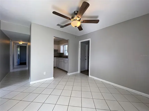 a view of an empty room and window