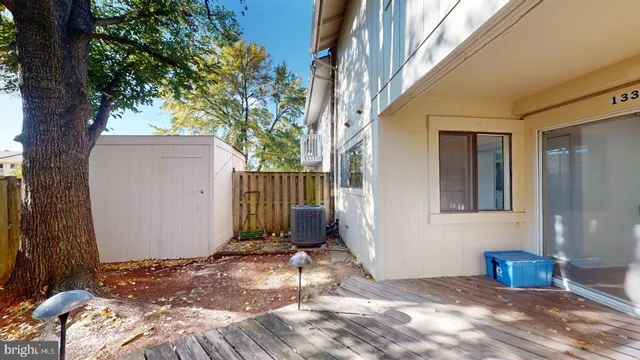 a view of a house with a tree