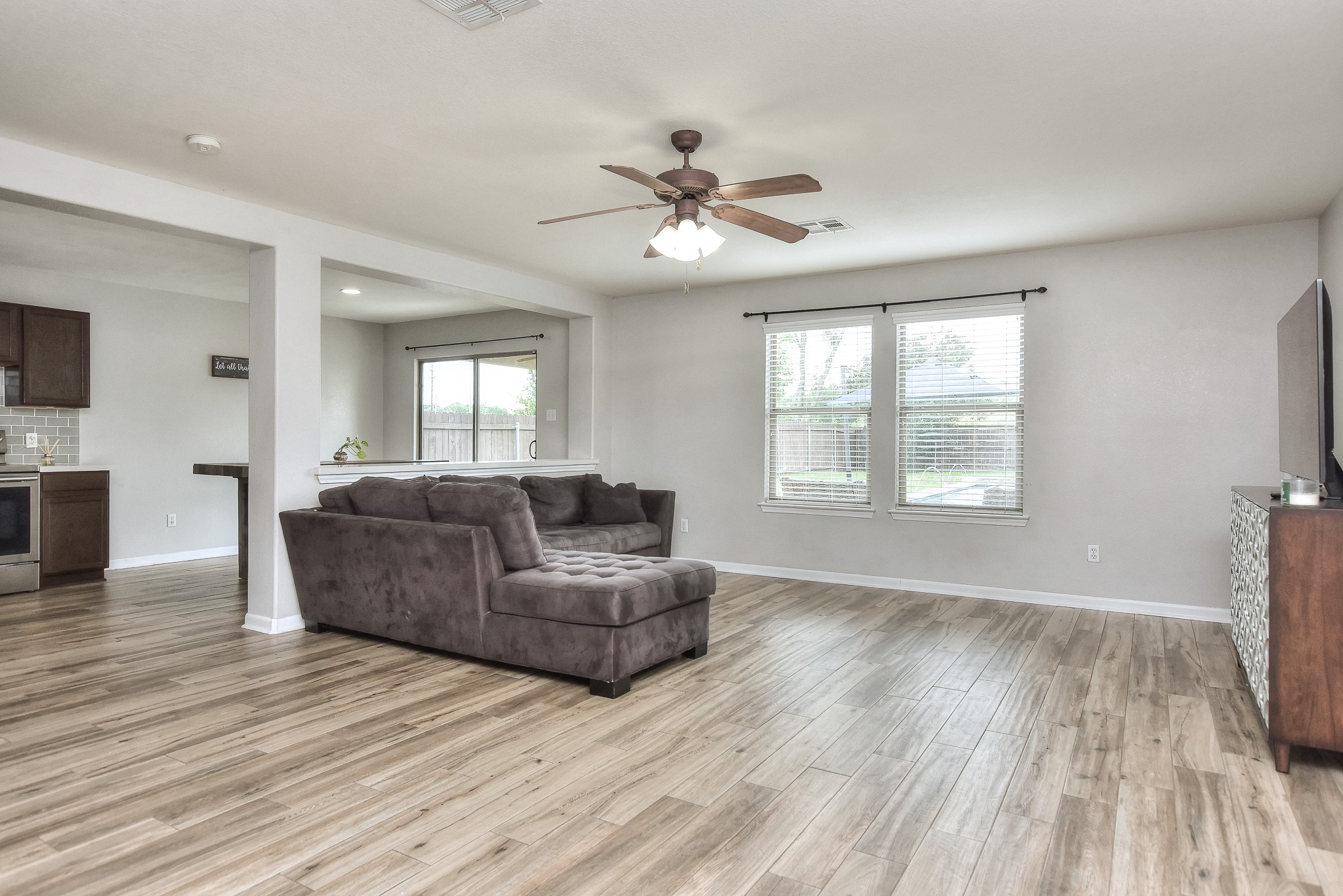 74 Jan Lane Georgetown, TX 78626 - Photo 17 of 31 a living room with furniture and a wooden floor